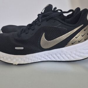 Nike Black Running Shoes with Metallic Swoosh